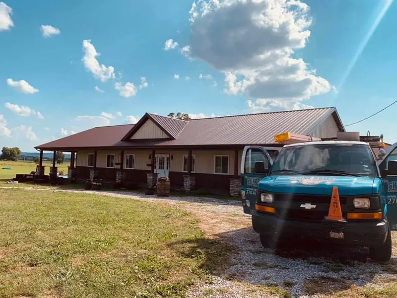 Ranch home with a long covered front porch after cleaning