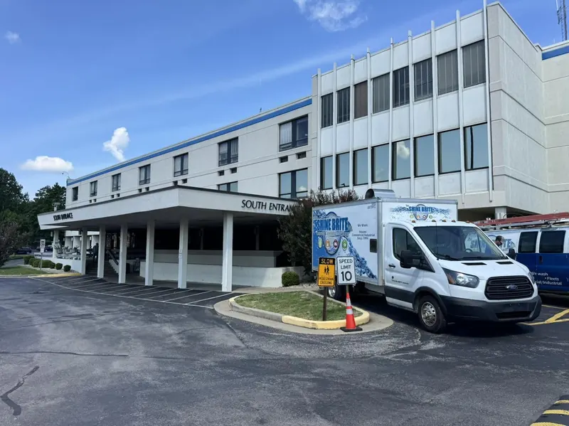 Shine Brite Transit box truck at a multi-story medical office building
