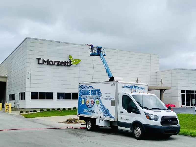 Transit box truck and lift at a plant